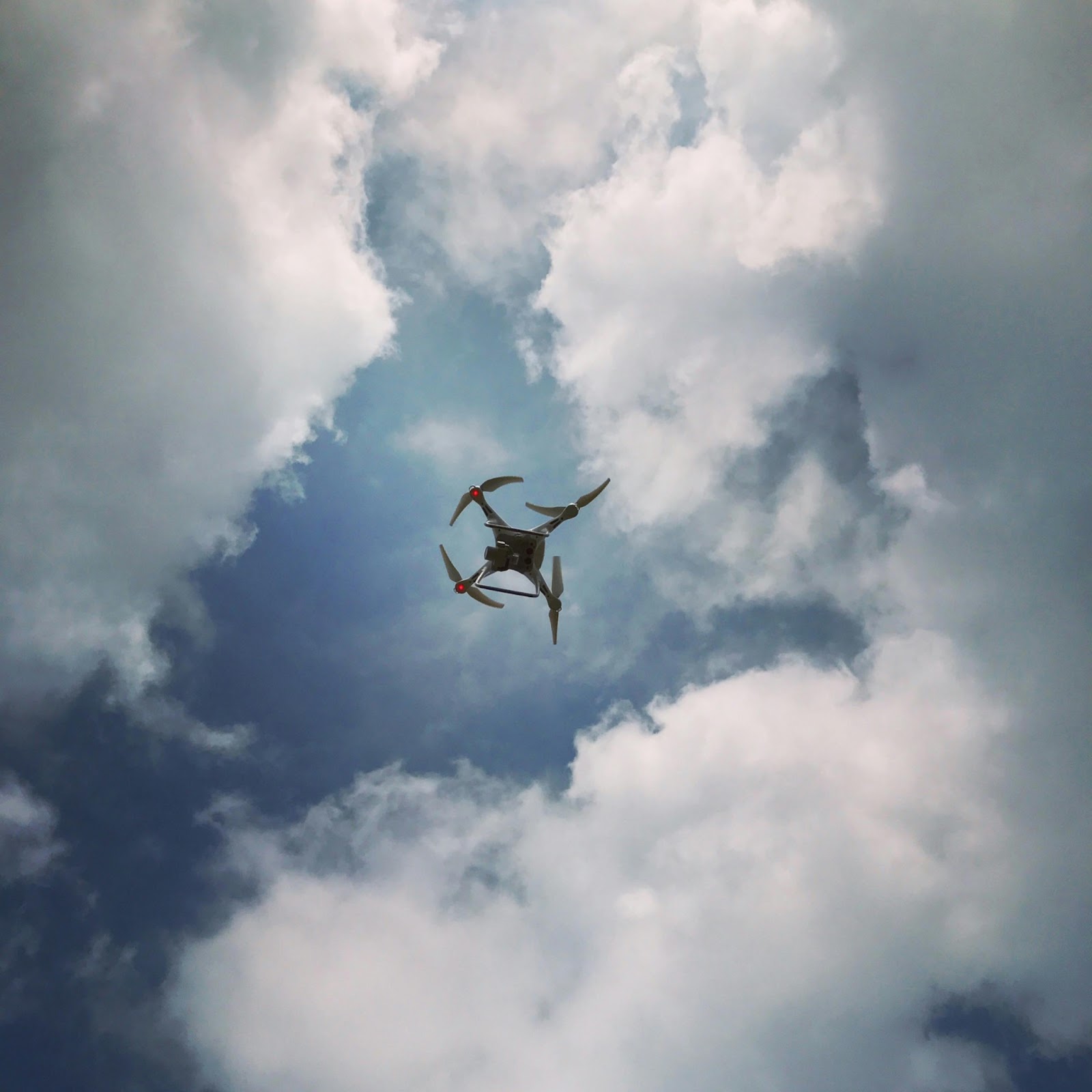 A drone carrying out an aerial building inspection, reaching high elevations without scaffolding or ladders